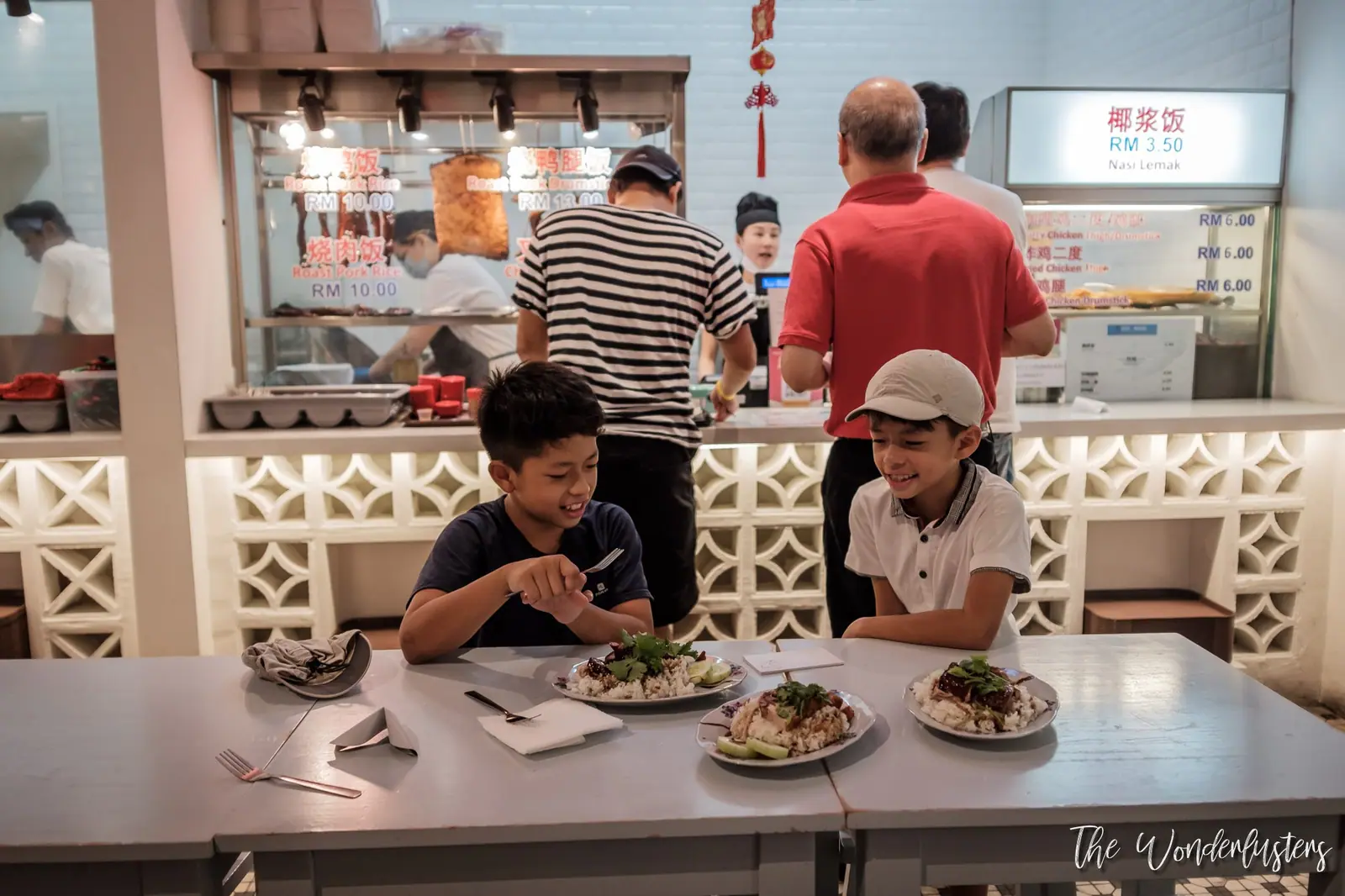 Eating roast duck rice in Malaysia